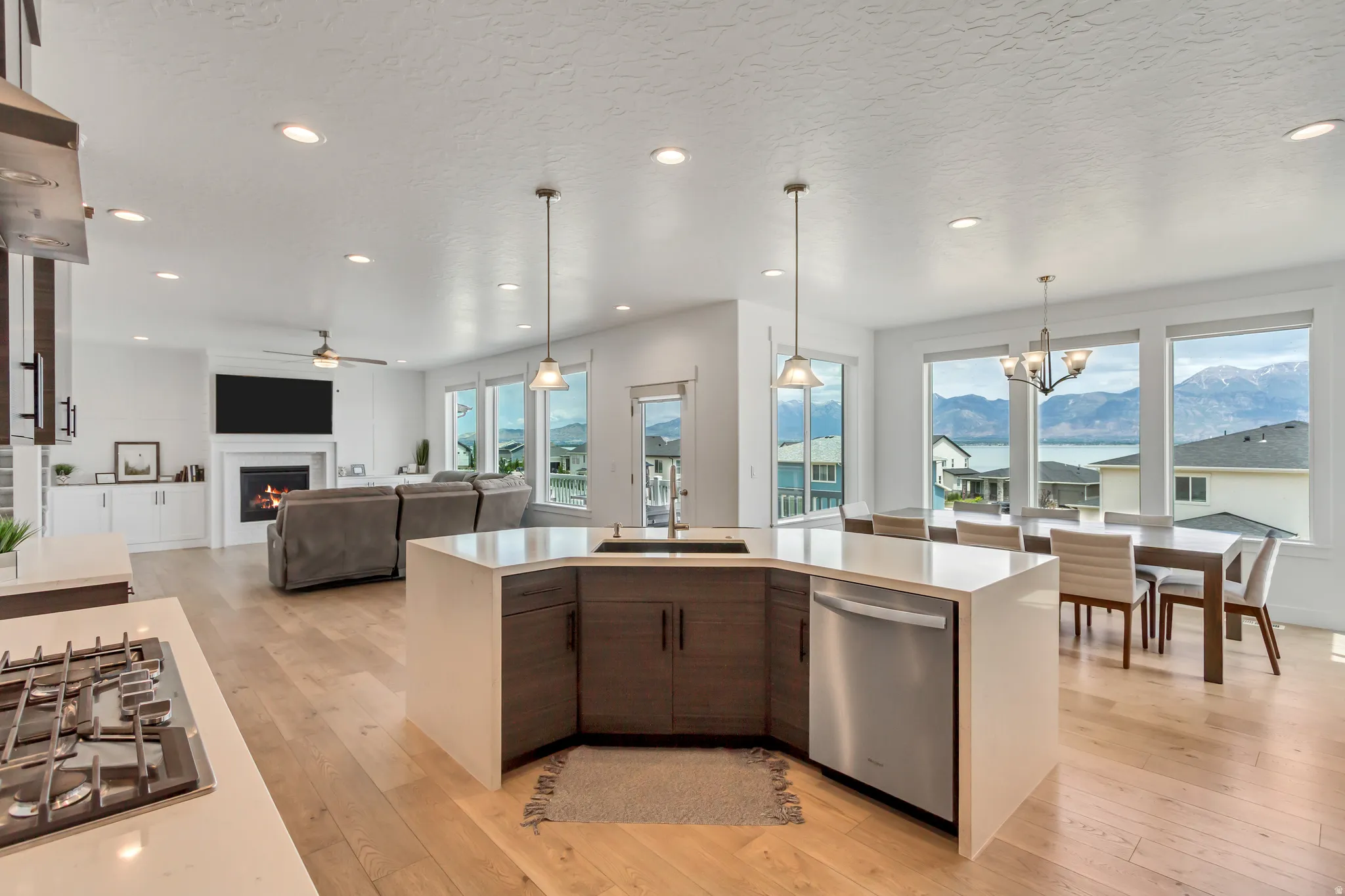 Open-concept living area with lots of large windows to take in the  fantastic views!