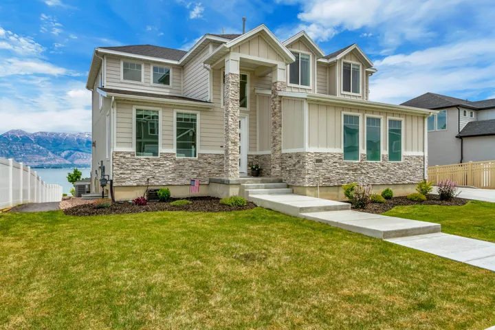 Beautiful west-facing home with stunning lake and mountain views!