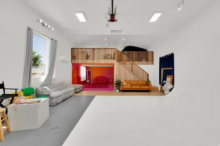 Photo Studio - Vaulted ceilings with recessed lighting over a spacious open-concept area