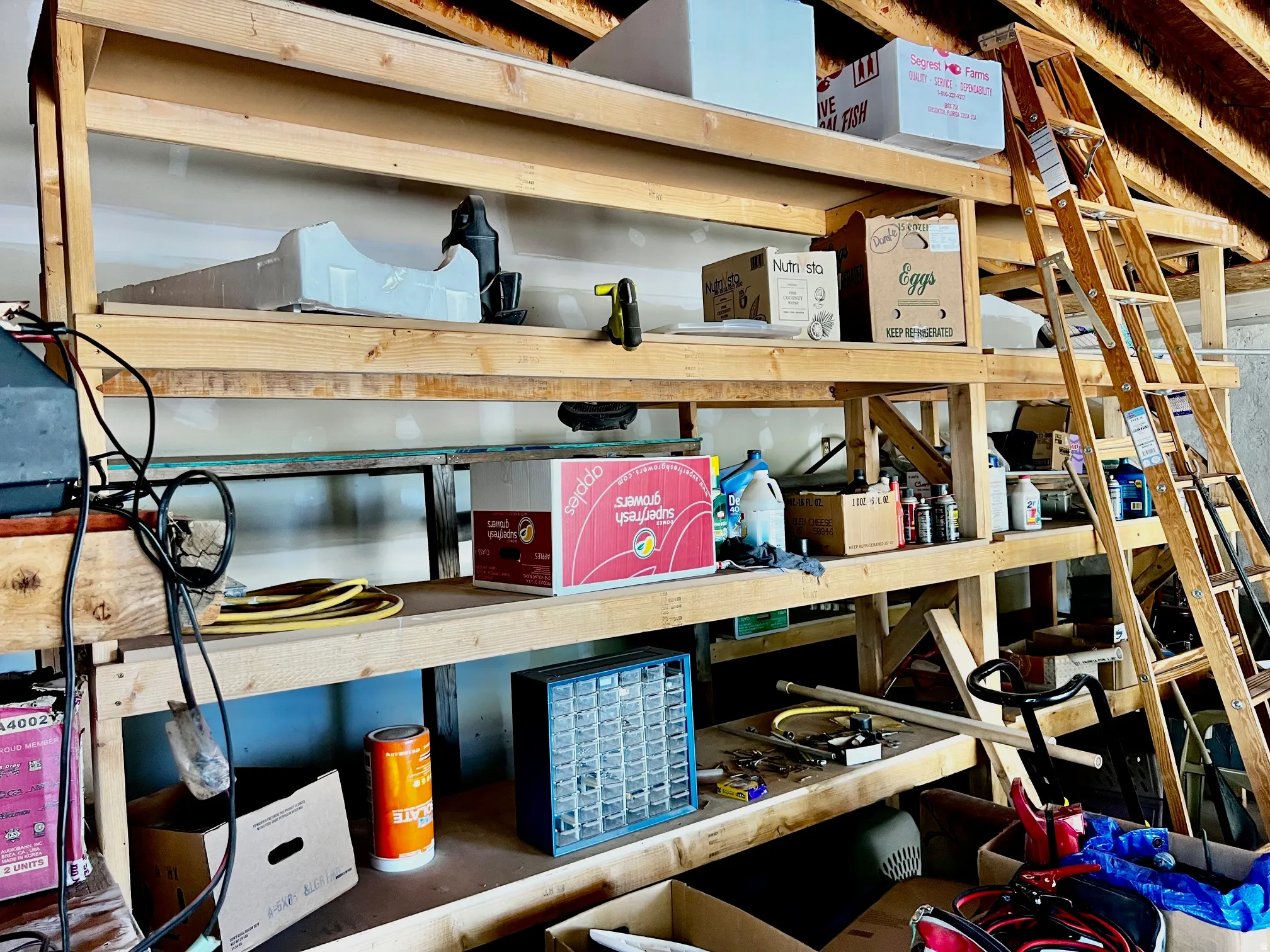 Built-in shelving system featuring multiple tiers of wood-finish storage