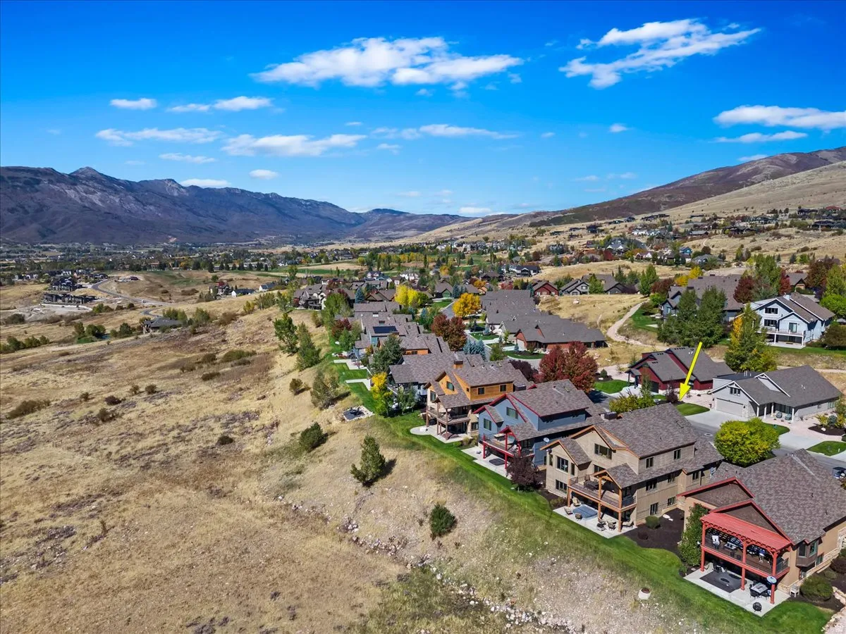 Expansive mountain and valley scenery provides a dramatic backdrop to a residential community