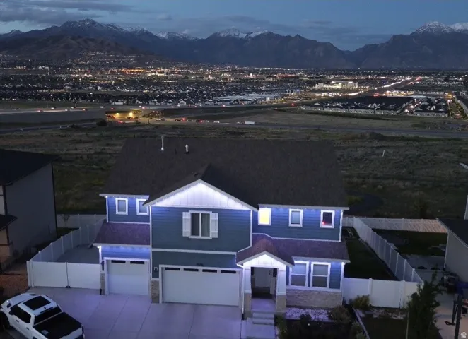 Two-story residence with blue siding and white trim