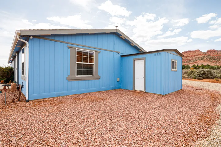 Home exterior with attached shed