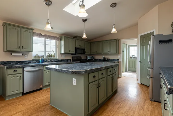 Updated kitchen with center island.