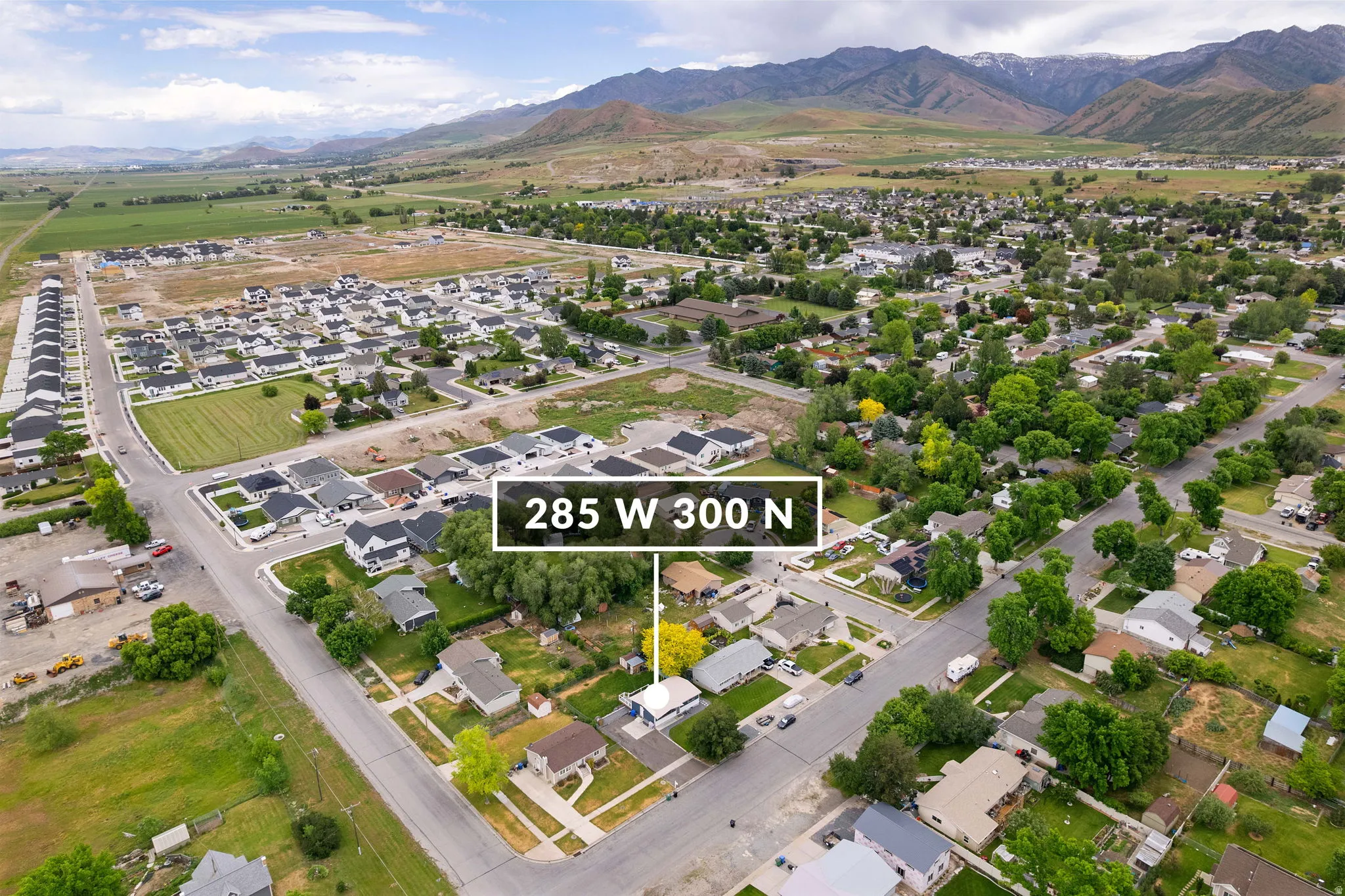 Aerial view showcasing the property within an established residential area