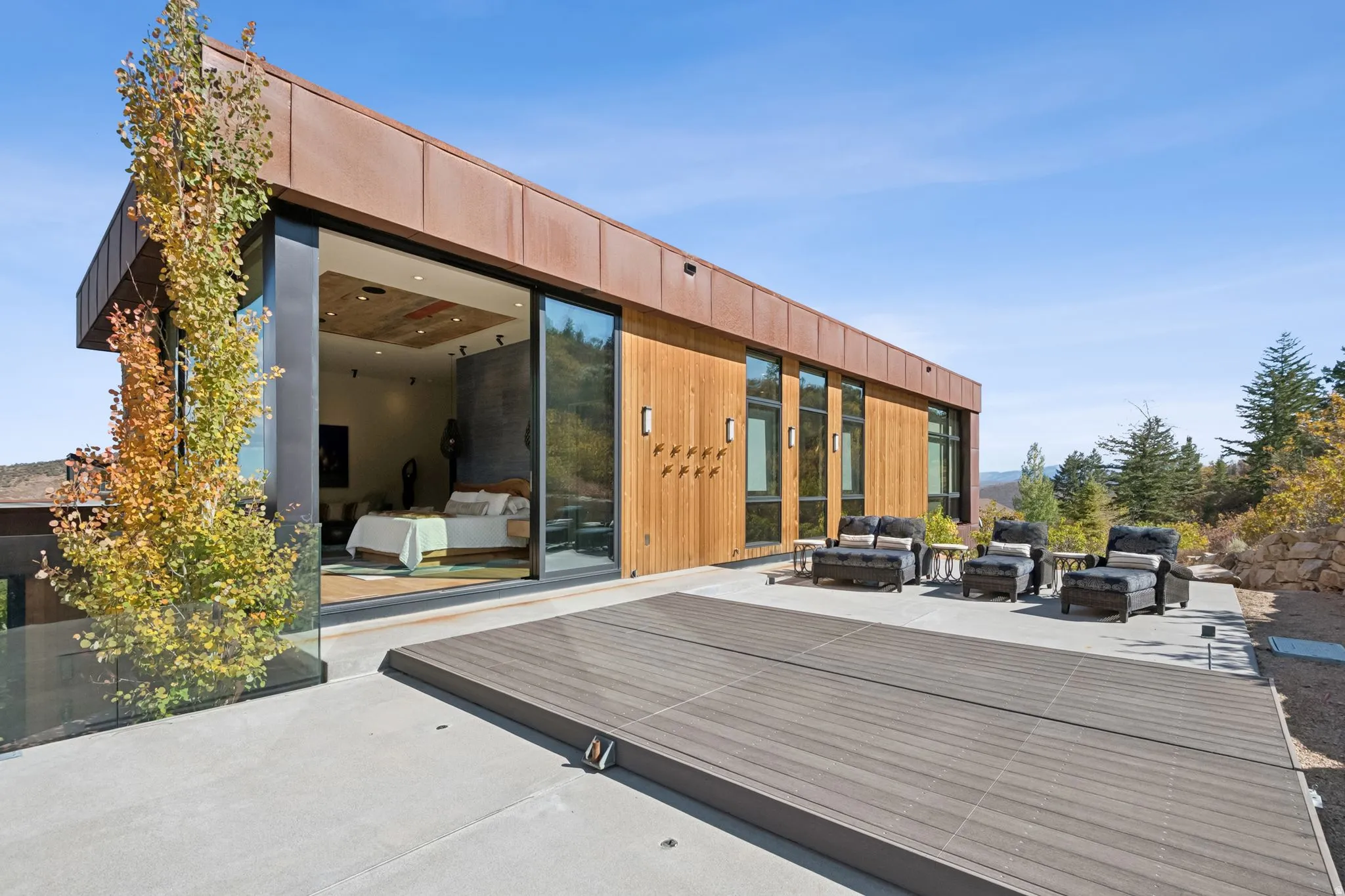 Deck with an outdoor hangout area and a patio area
