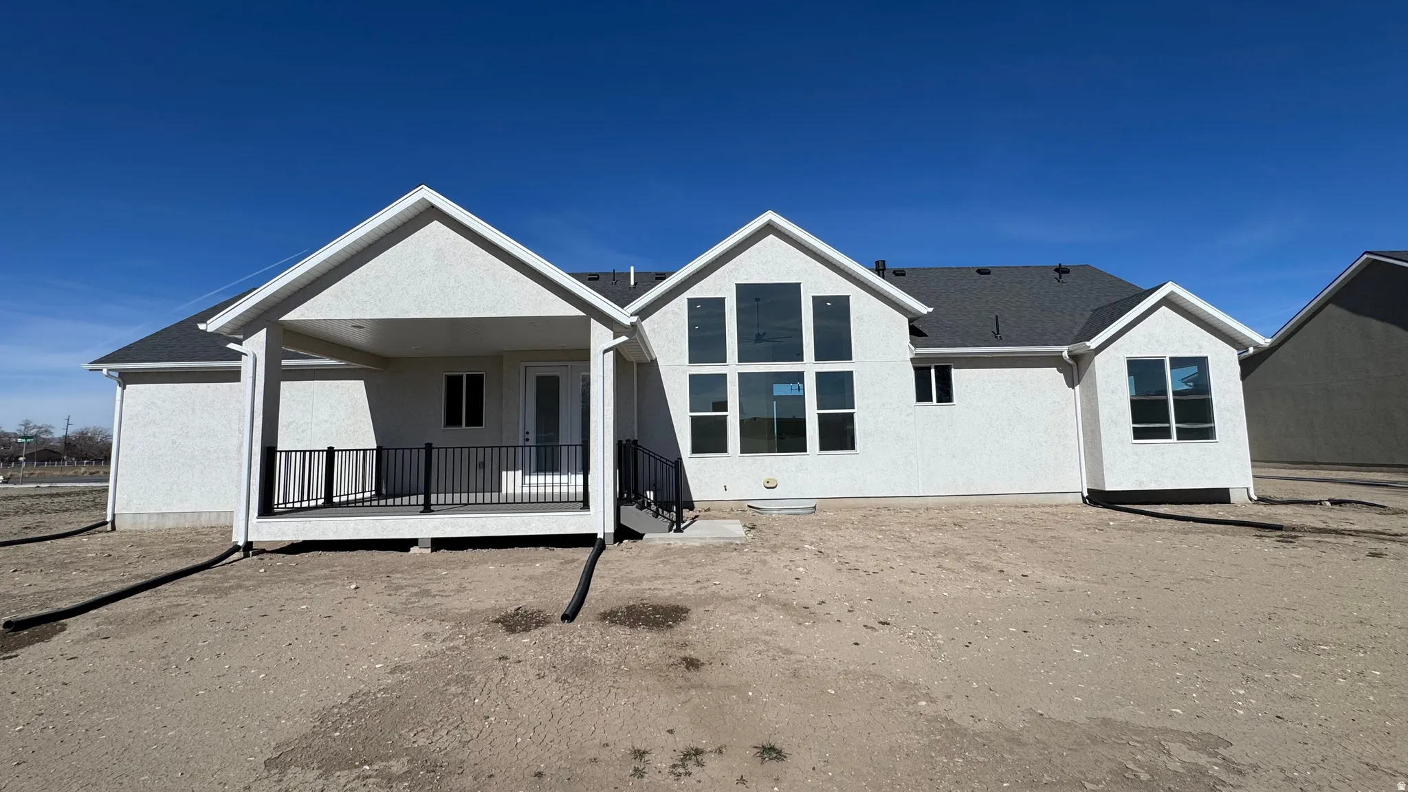 Previously built McKenna.  The McKenna being built has a covered patio rather than a covered deck.