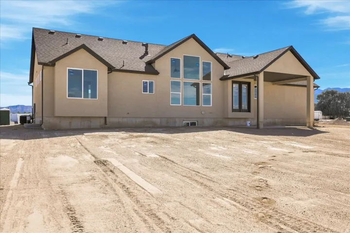 Backyard. Covered patio. .50 acre lot