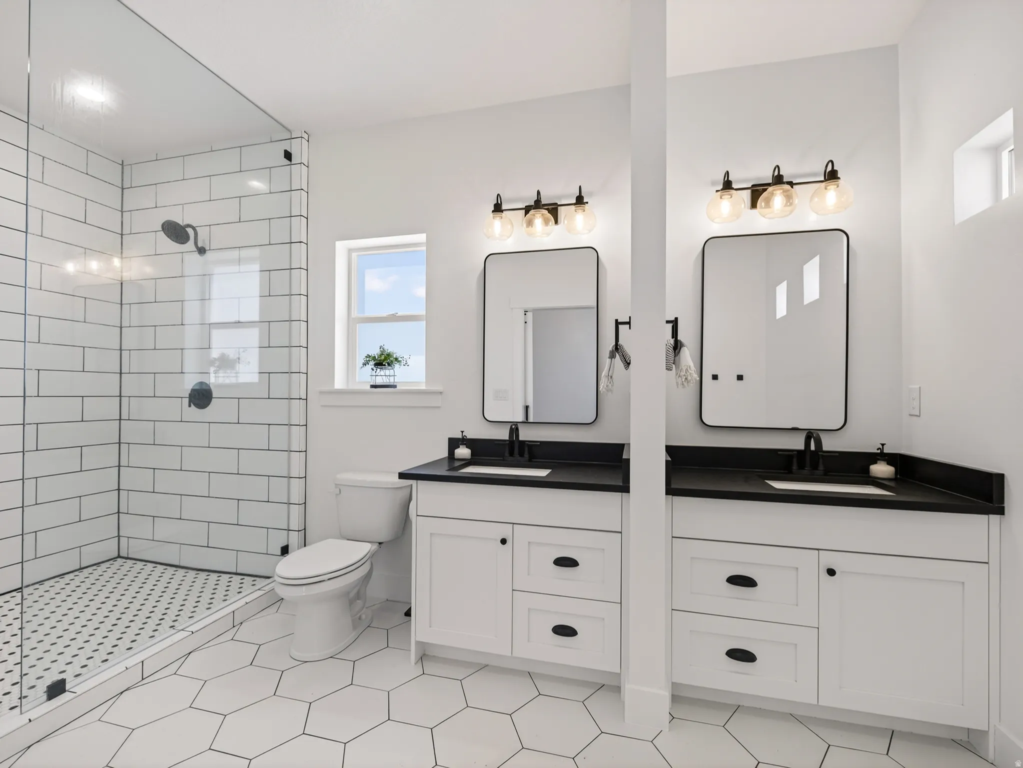 Master bath includes two beautiful sink vanities