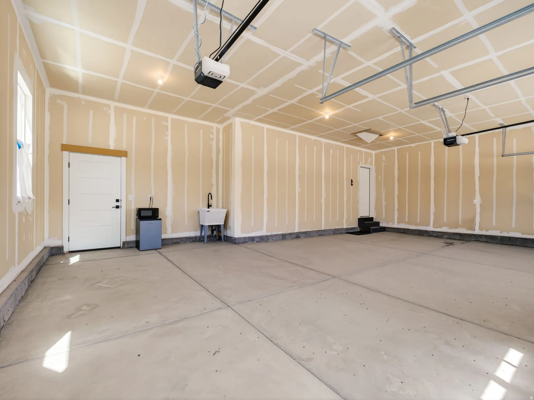 Spacious garage with a utility sink