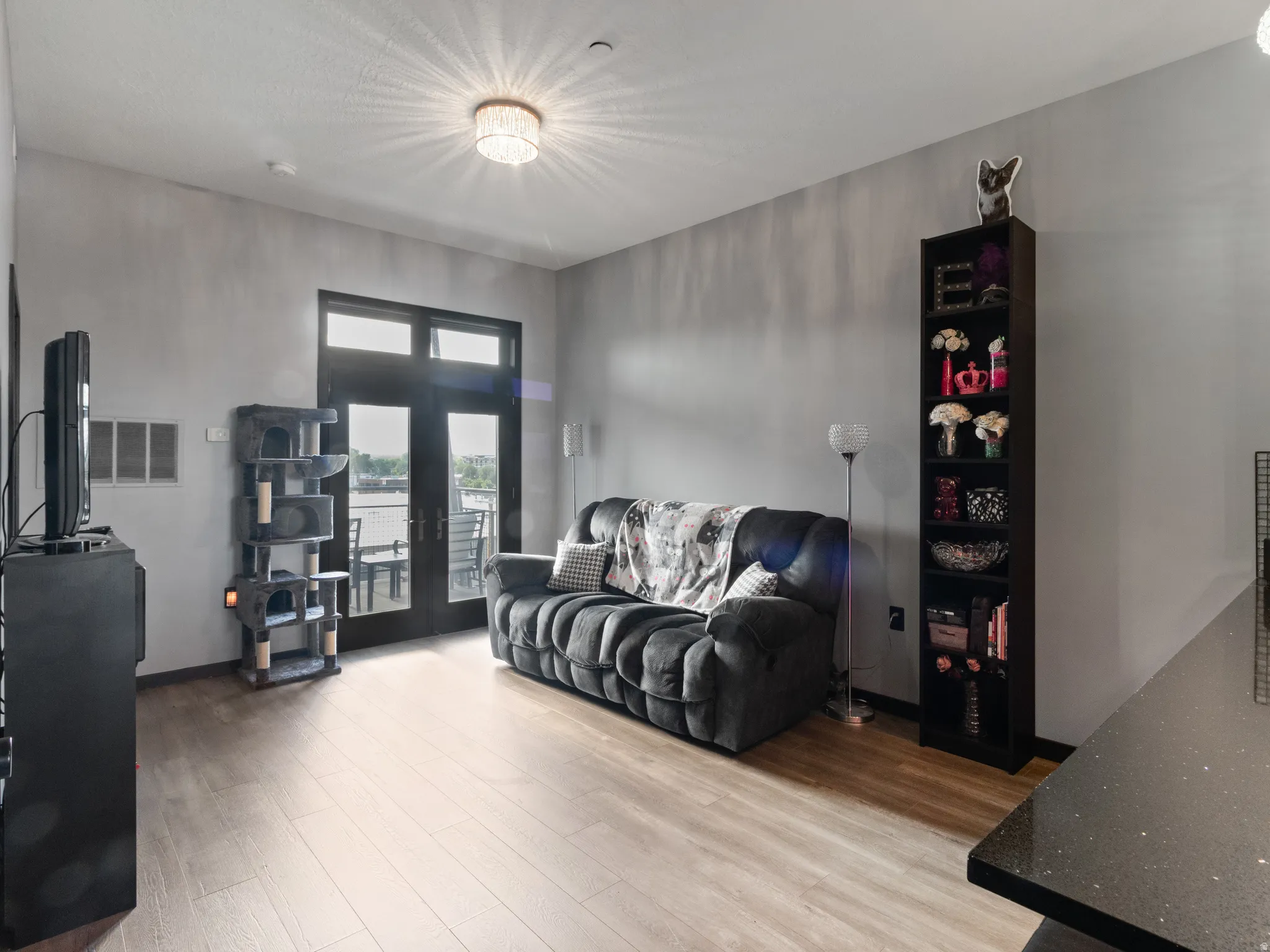 Hardwood-finish flooring throughout the living space