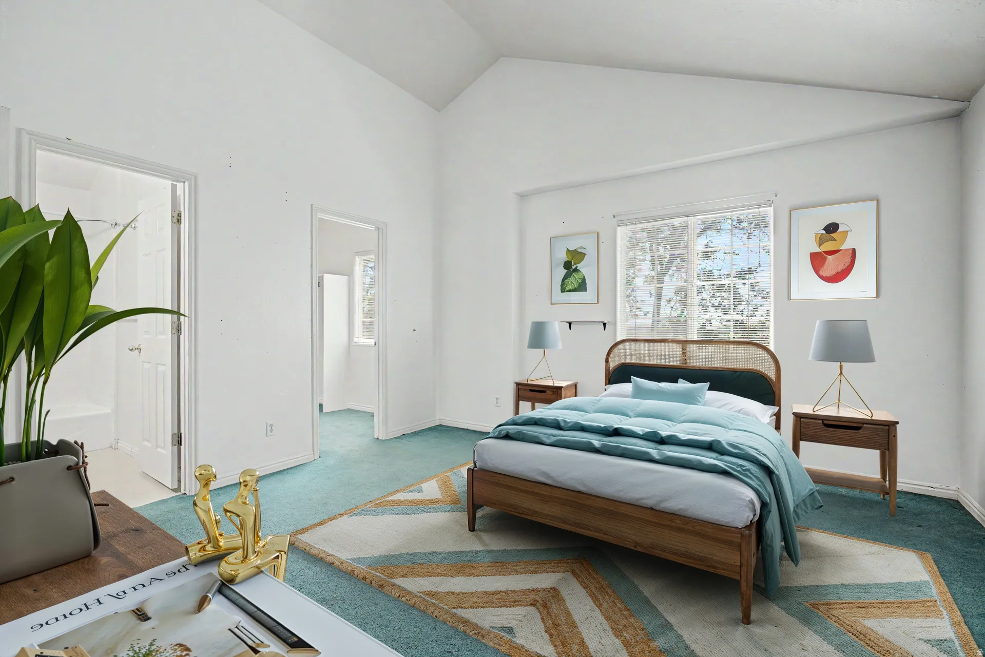 Virtually staged Vaulted ceilings highlight this room with white walls and light blue carpeting