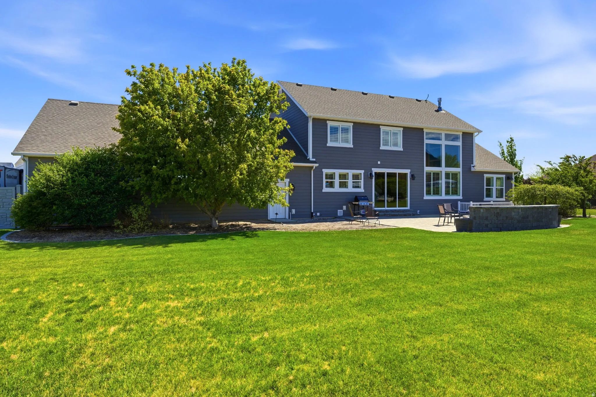 Expansive green lawn providing ample outdoor space