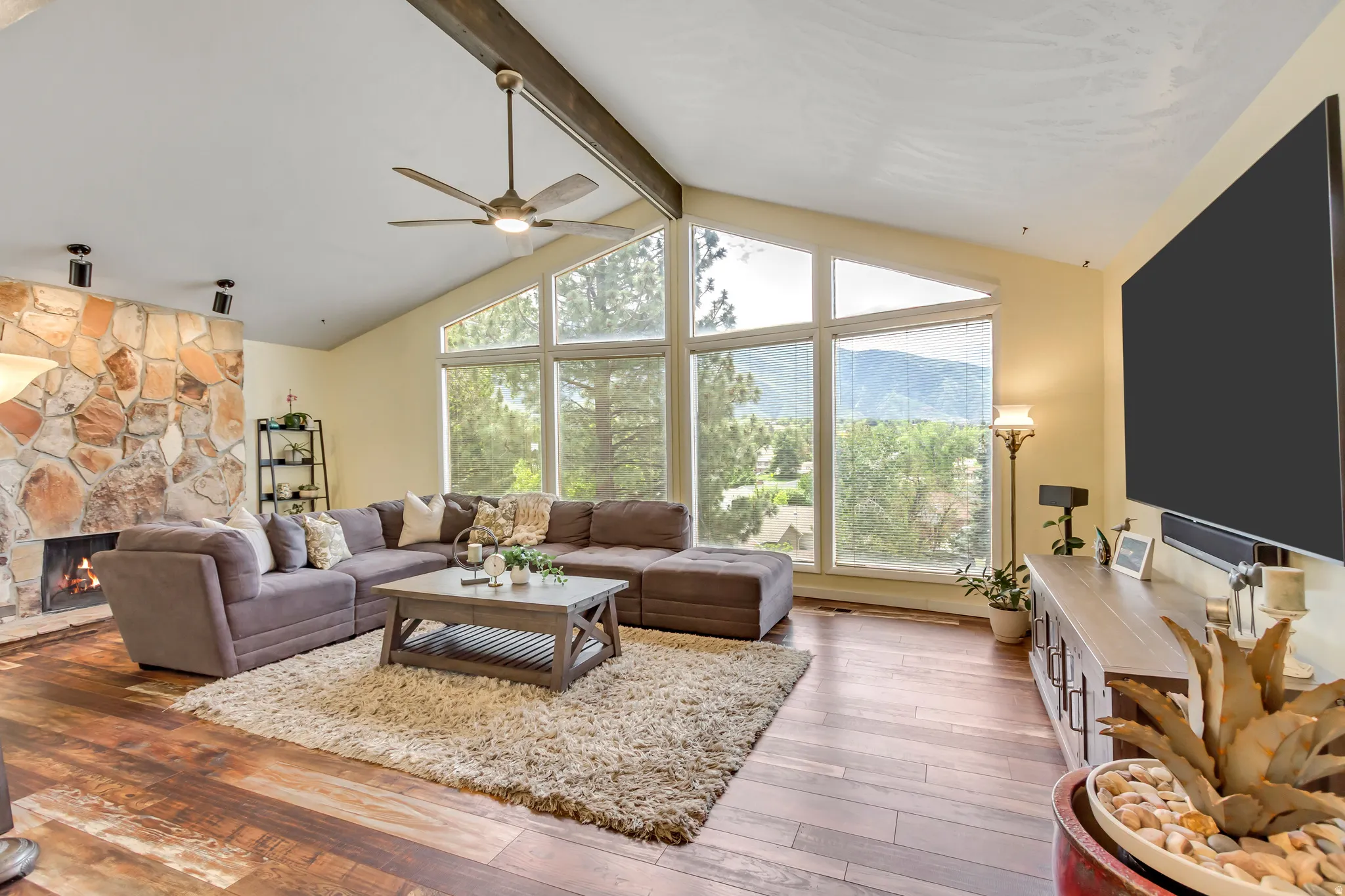 Spacious Family Room with vaulted ceiling and expansive windows