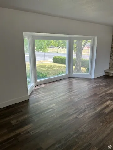 Bay window featuring multiple panes and white trim