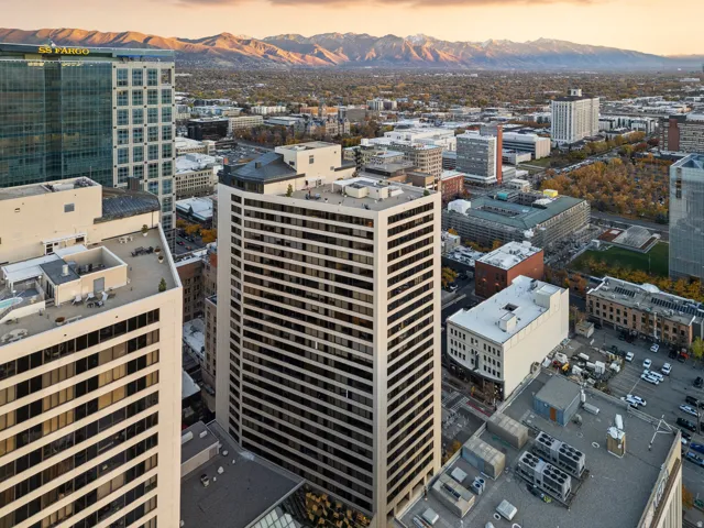 High-rise building featuring a multi-story facade with horizontal window bands
