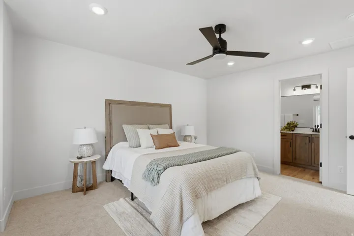 Bedroom featuring plush carpeting and recessed lighting