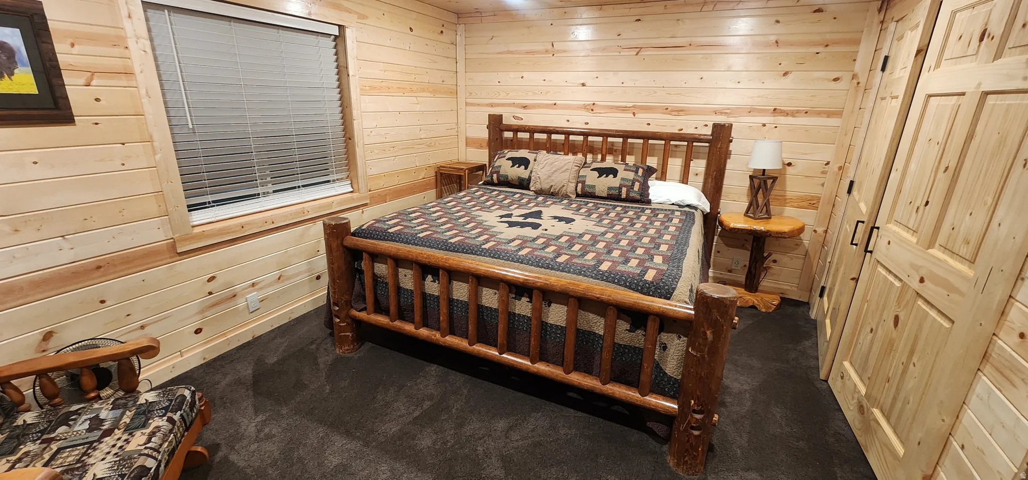 Interior room featuring wood-finish walls and a coordinating wood-finish ceiling
