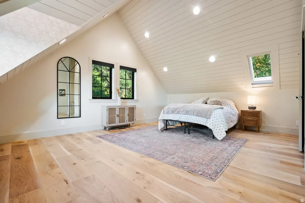 Vaulted shiplap ceiling with recessed lighting