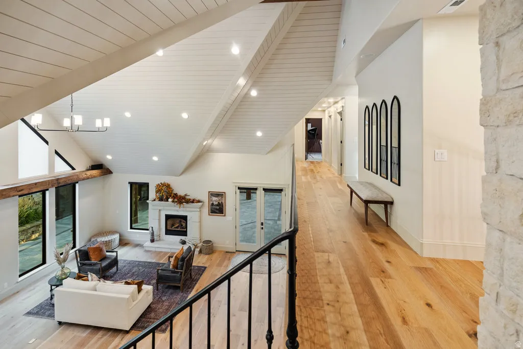 Vaulted ceilings featuring shiplap and recessed lighting
