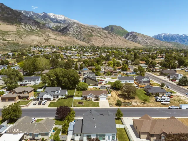 Expansive neighborhood setting featuring a mountainous backdrop with snow-capped peaks