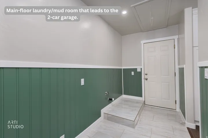 Laundry/mud room featuring beadboard wainscoting, light-toned wall paint, and tile flooring