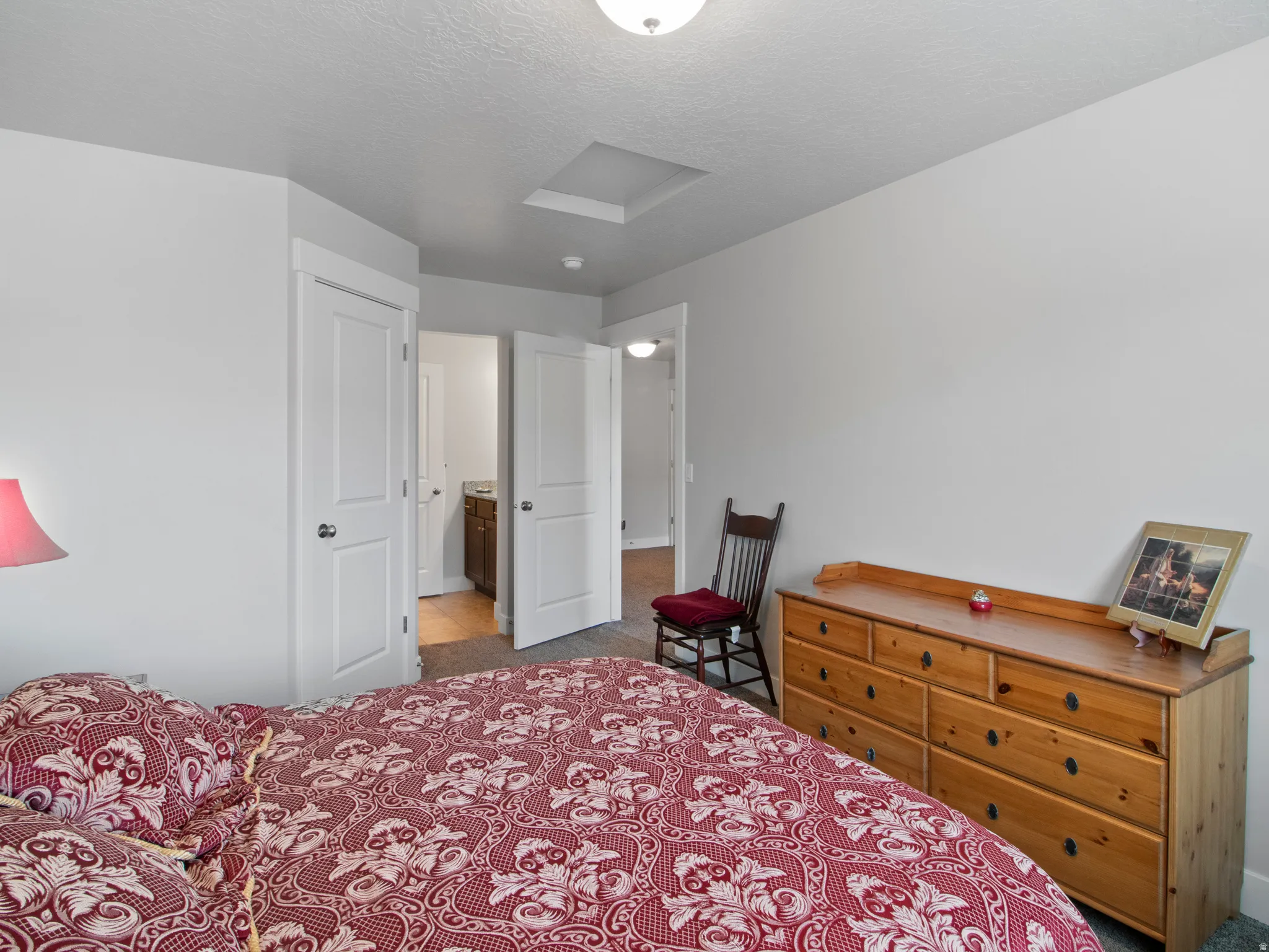 Bedroom featuring carpet flooring and light gray walls