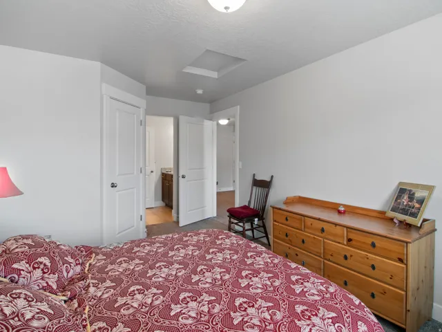 Bedroom featuring carpet flooring and light gray walls