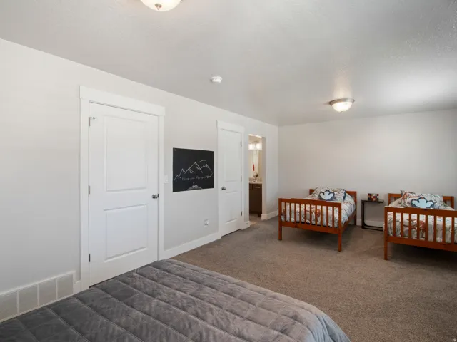 Neutral wall paint with carpeted flooring