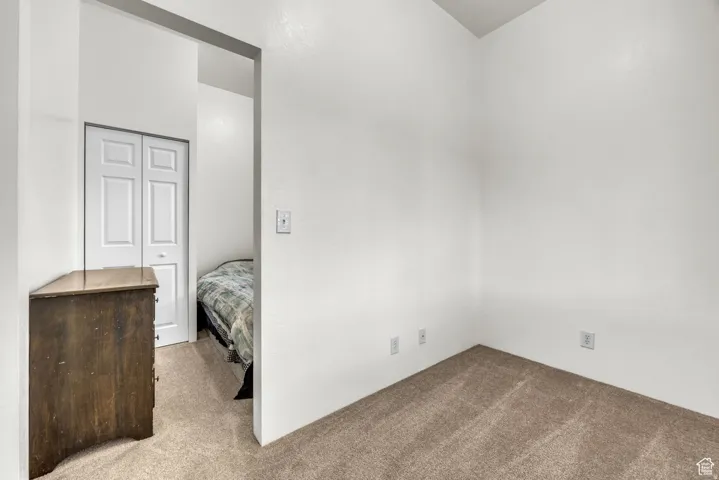 Neutral-toned carpeting throughout