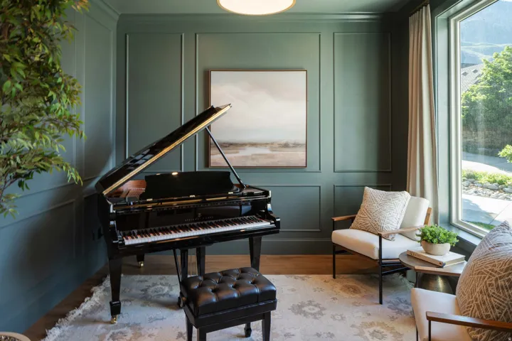Formal room featuring panel molding, wood-finish flooring, a large picture window, and recessed lighting