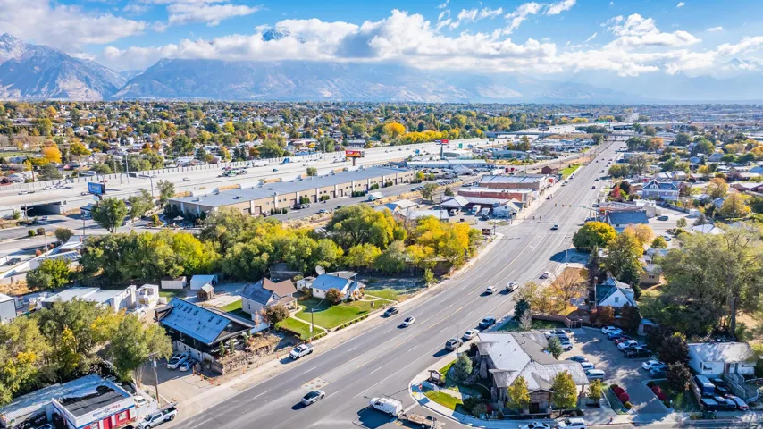 Expansive urban landscape with a prominent highway system and commercial structures