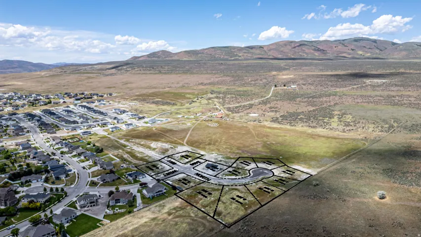Planned residential development featuring delineated lots, a cul-de-sac, and paved roads