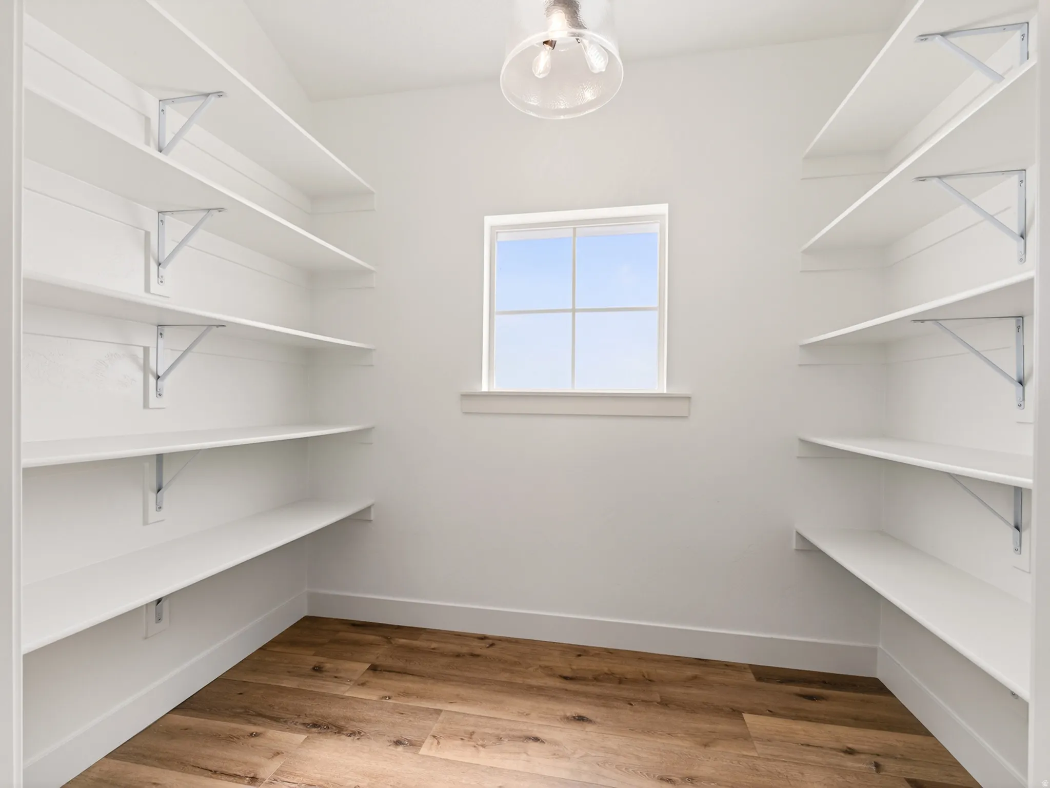Lots of built-in pantry shelving and natural light