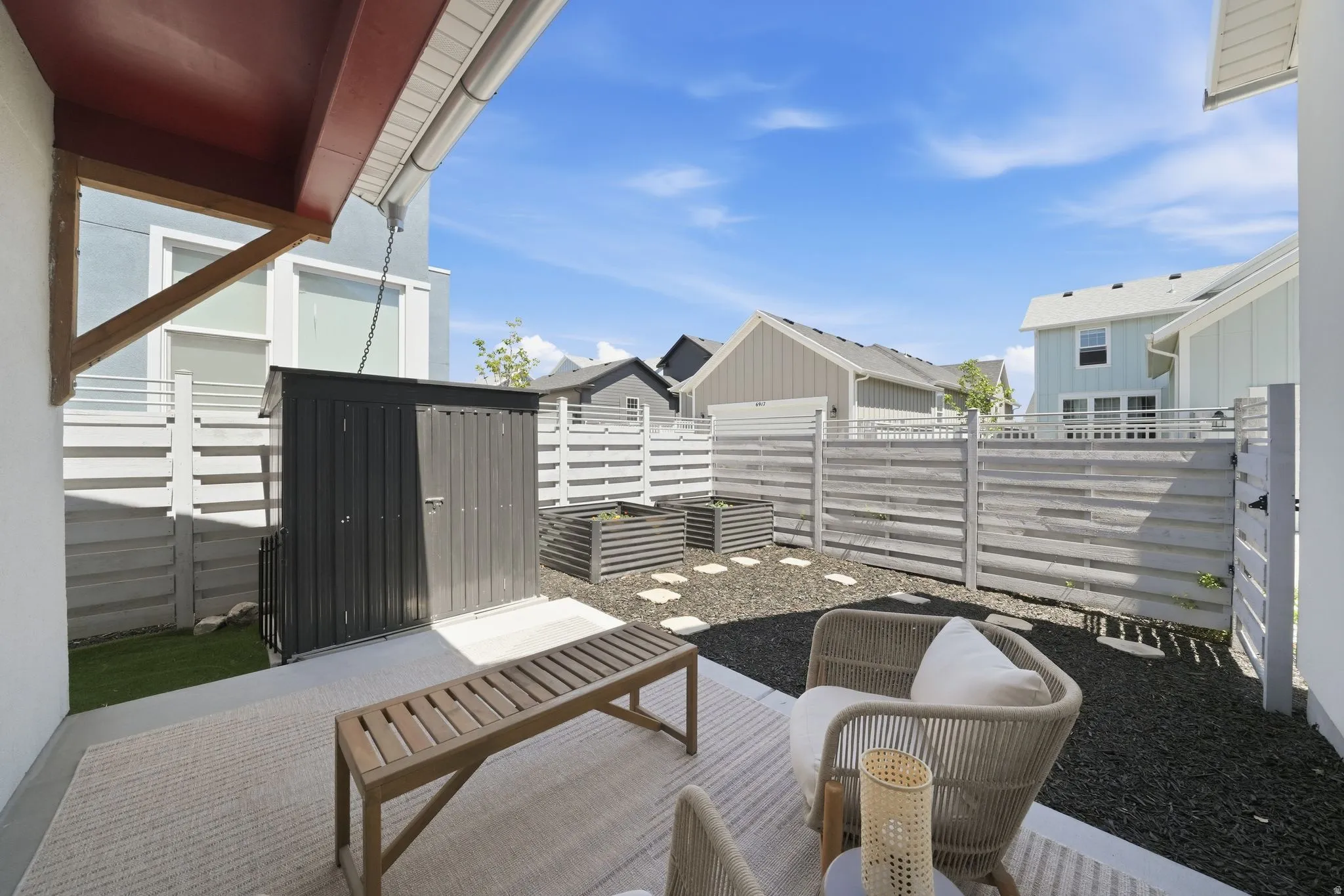 Covered patio featuring a concrete surface and an outdoor rug