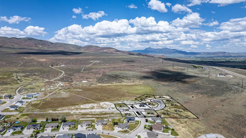 Aerial perspective showcasing multiple land parcels outlined for development