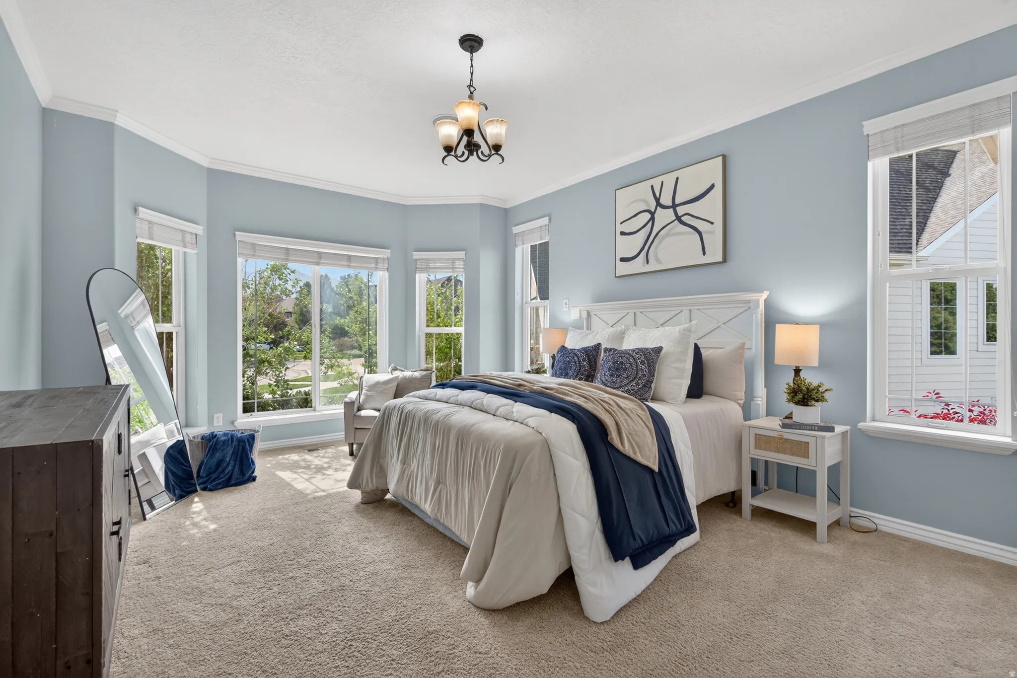 Bay window with multiple large windows, offering natural light and exterior views