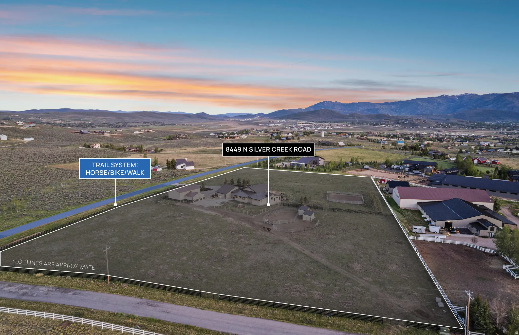 Expansive rural property featuring multiple structures and direct access to a horse, bike, and walk trail system