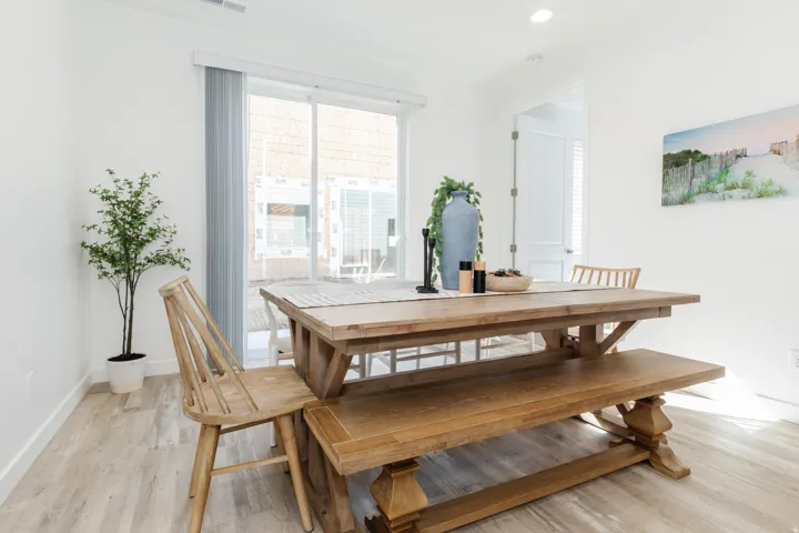 Open concept room featuring wood-finish flooring, white walls, and recessed lighting