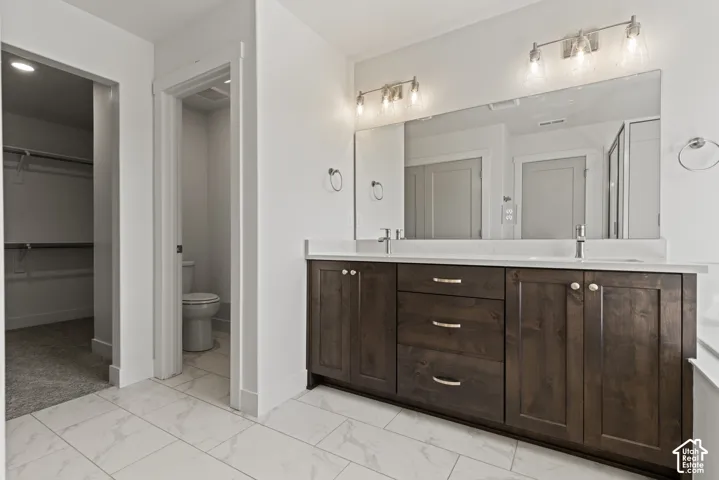 White tile flooring with subtle gray veining