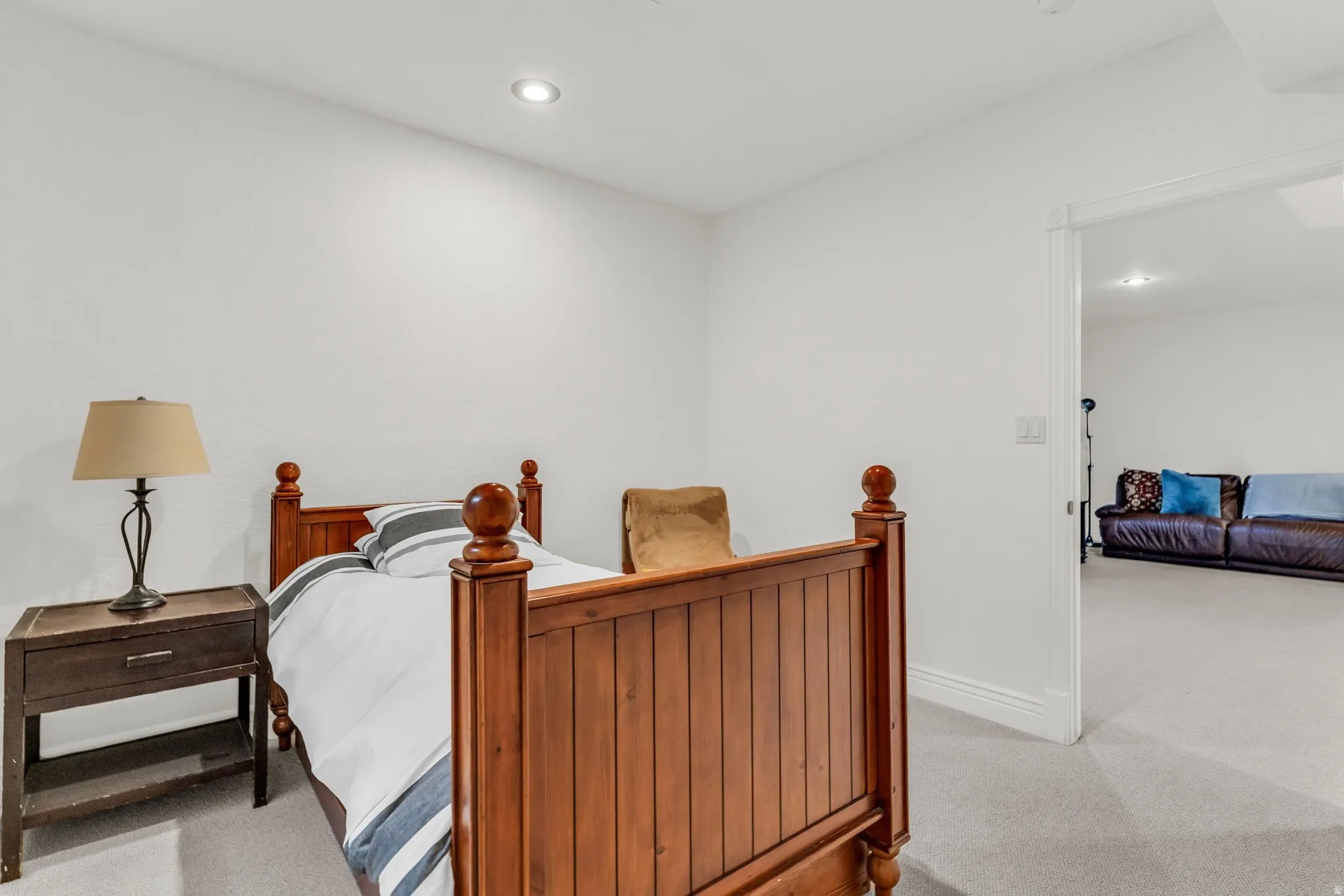 5th  Bedroom featuring light-toned walls, recessed lighting, and carpet flooring