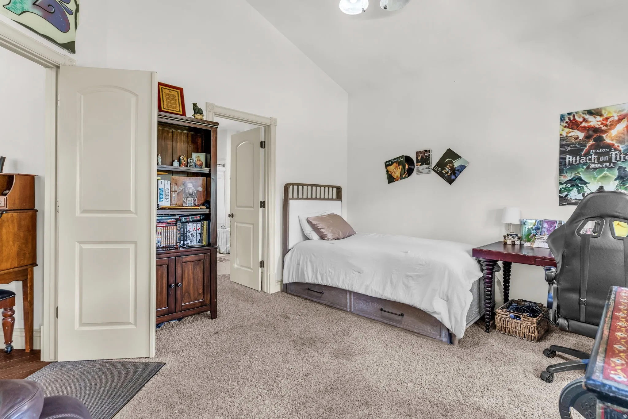 main level master suite with a vaulted ceiling