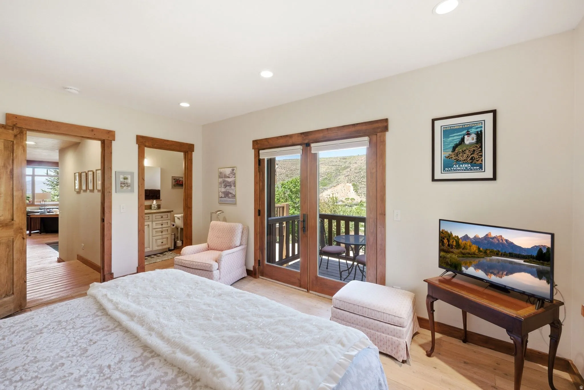 Interior room featuring wood-finish flooring and recessed lighting