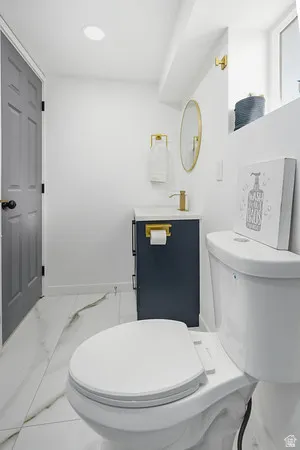 White toilet with a built-in bidet feature