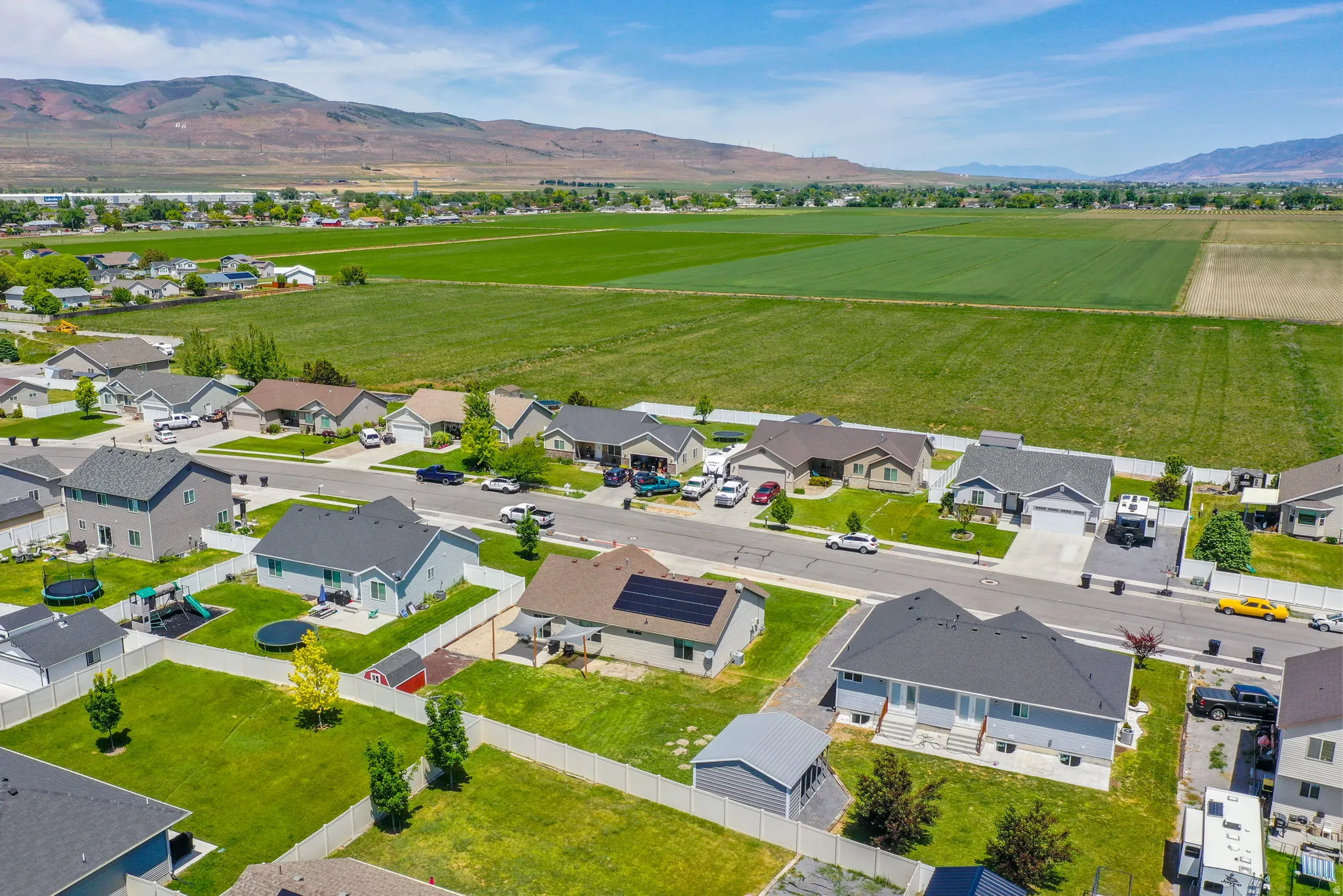 Aerial perspective showcasing a residential neighborhood with varied home styles
