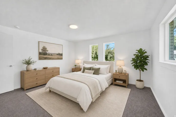 Virtual staging included to showcase room potential. Bright interior space with white walls and gray carpeting