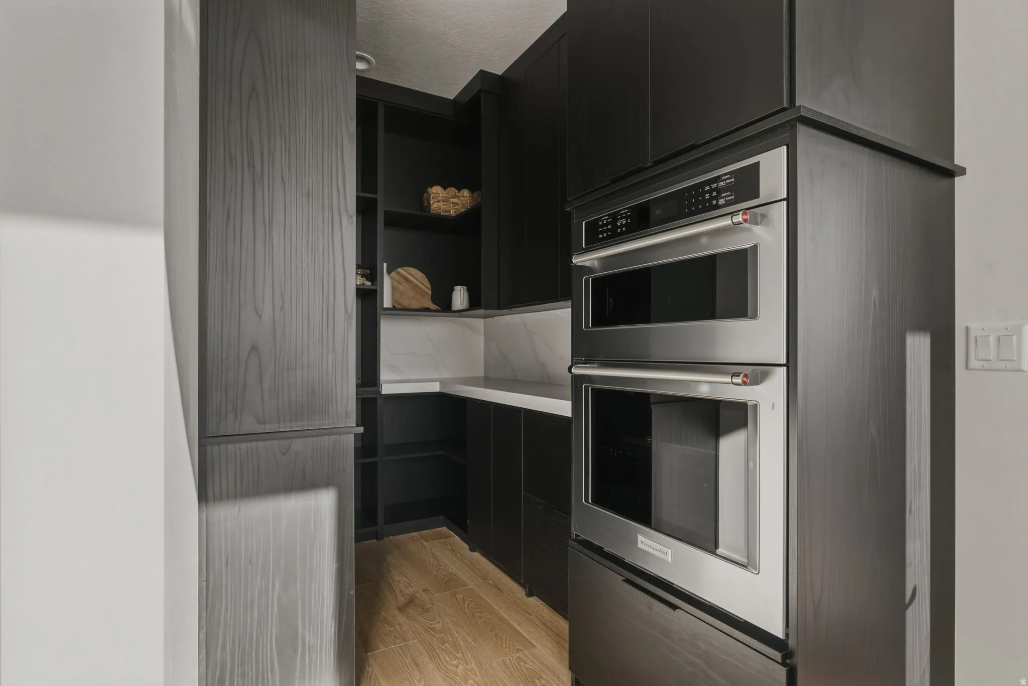 Built-in stainless steel double oven with coordinating microwave