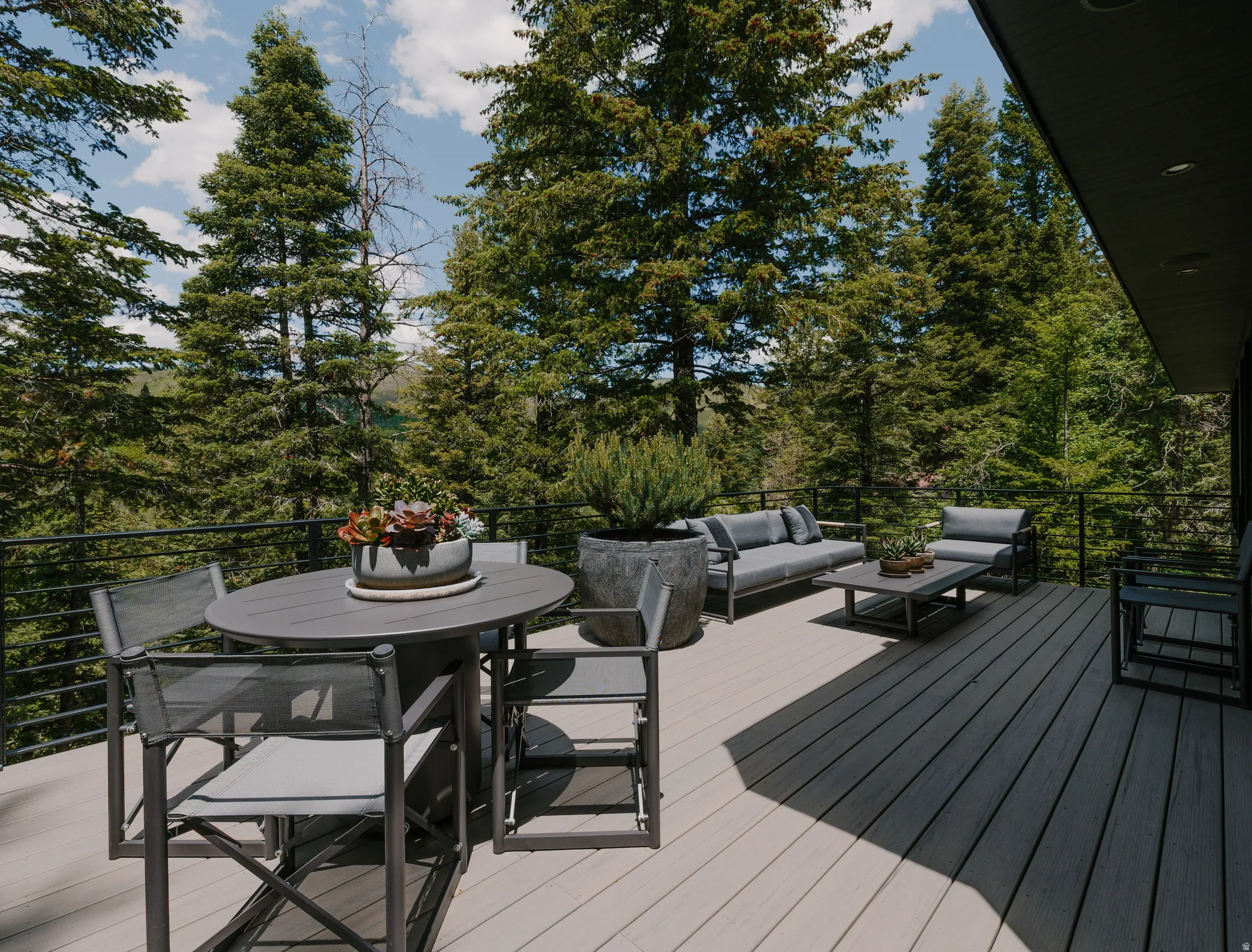 Spacious outdoor deck featuring light-toned composite decking