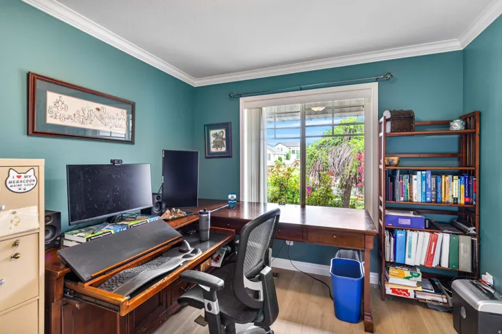 Spacious room with a large window, providing ample natural light