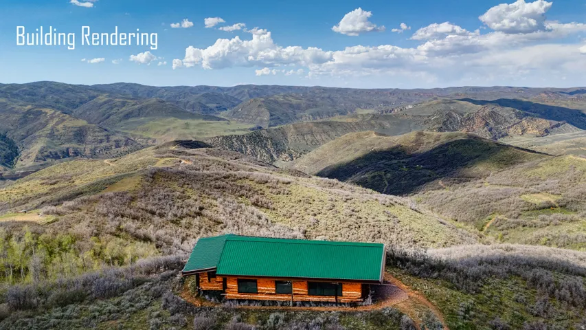 Log cabin-style residence featuring a vibrant green metal roof